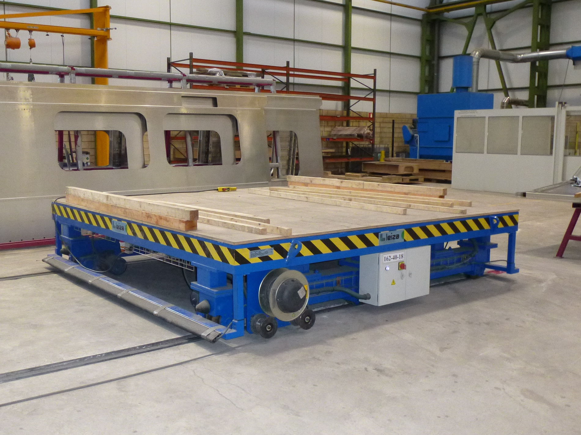 Bespoke manufacture of railed carriages without lifting mechanism for any industrial sector